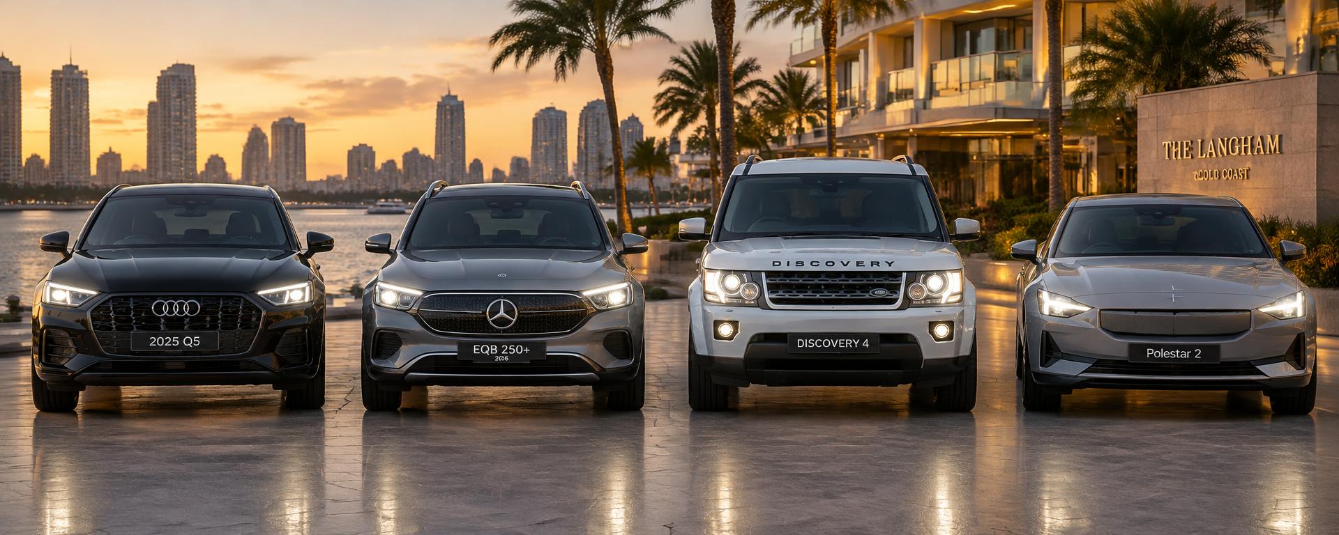 Front-facing black Audi Q5, grey 2026 Mercedes-Benz EQB250+, white Land Rover Discovery 4 and grey Polestar 2, beside the Gold Coast waterfront